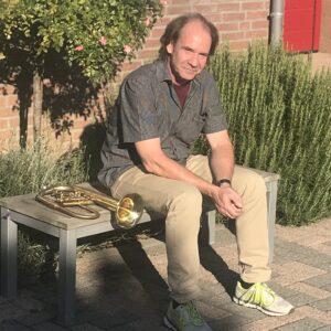 Chris Kase with his OIRAM Ack flugelhorn in our garden